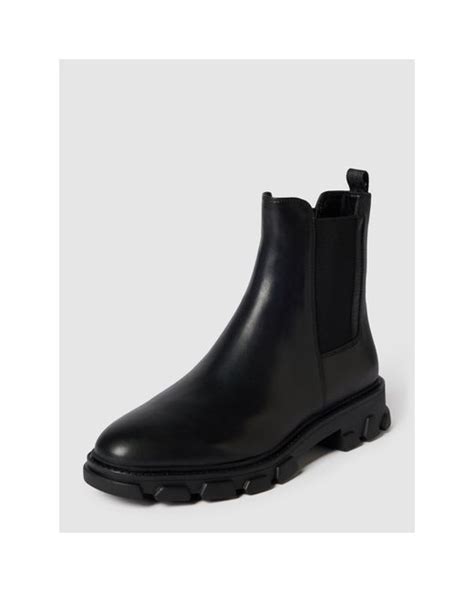 michael kors gummi boots